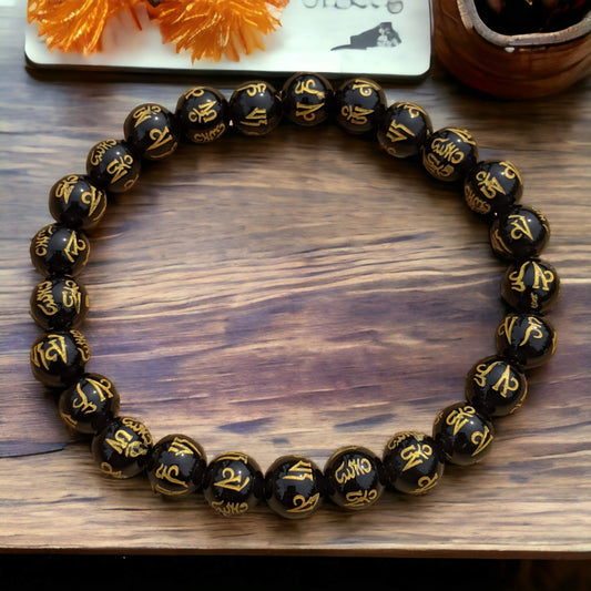 Black Onyx Bracelet with Golden Tibetan Inscriptions