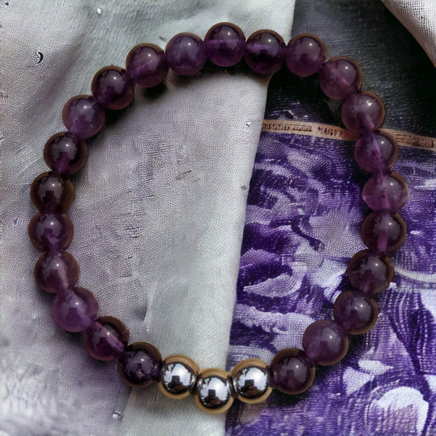 Amethyst Bracelet with Silver Plated Hematite Centre