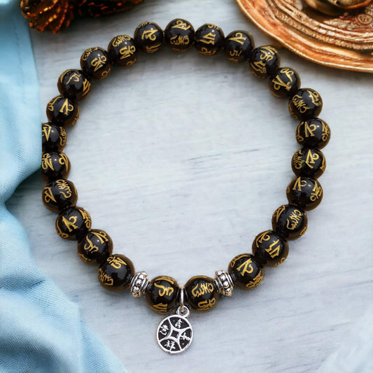 Black Onyx Bracelet with Golden Tibetan Inscriptions and Tibetan Lucky Coin Charm