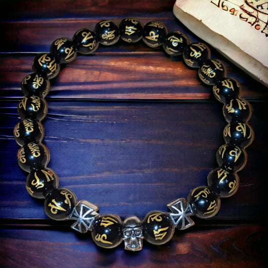 Black Onyx Bracelet with Golden Tibetan Inscriptions, Small SKULL Charm and Tibetan Crosses