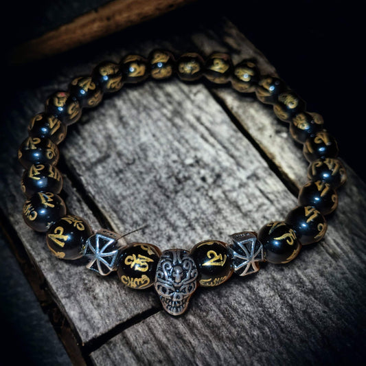 Black Onyx Bracelet with Golden Tibetan Inscriptions, Large SKULL Charm and Tibetan Crosses