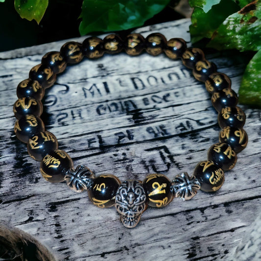 Black Onyx Bracelet with Golden Tibetan Inscriptions, Large SKULL Charm and Small Tibetan Crosses