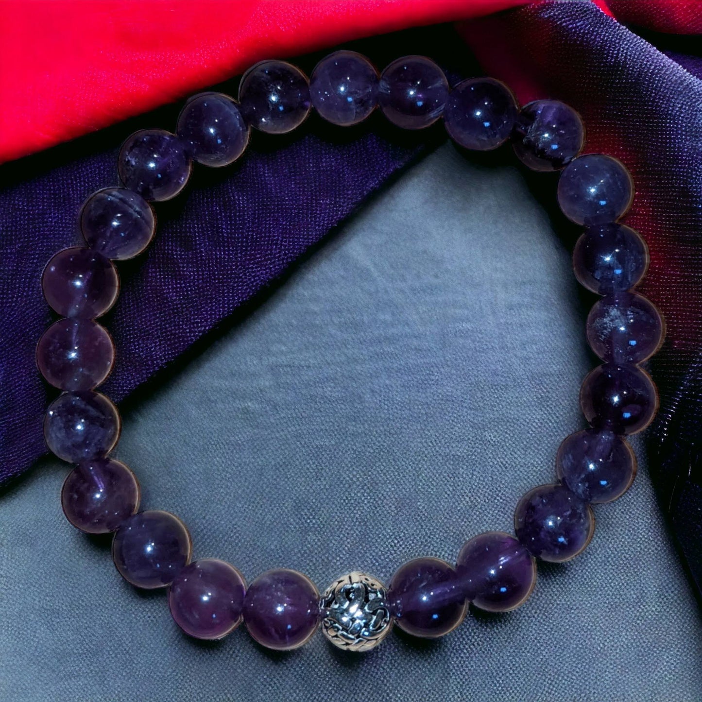 Amethyst Bracelet with Silver Tibetan Bead Centre